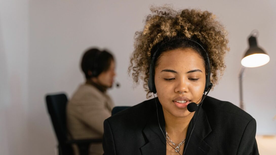 Working employee in a meeting with a headset on