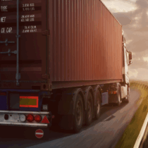 Picture shows a truck driving into sunset