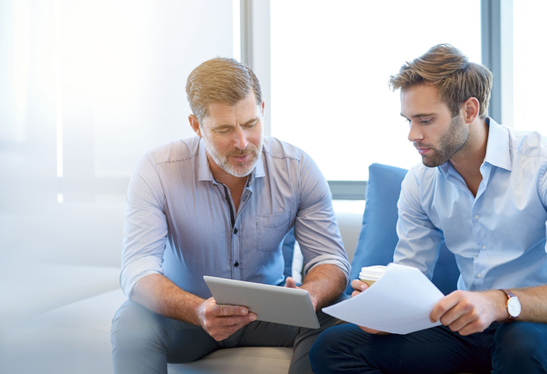 two business men with tablet