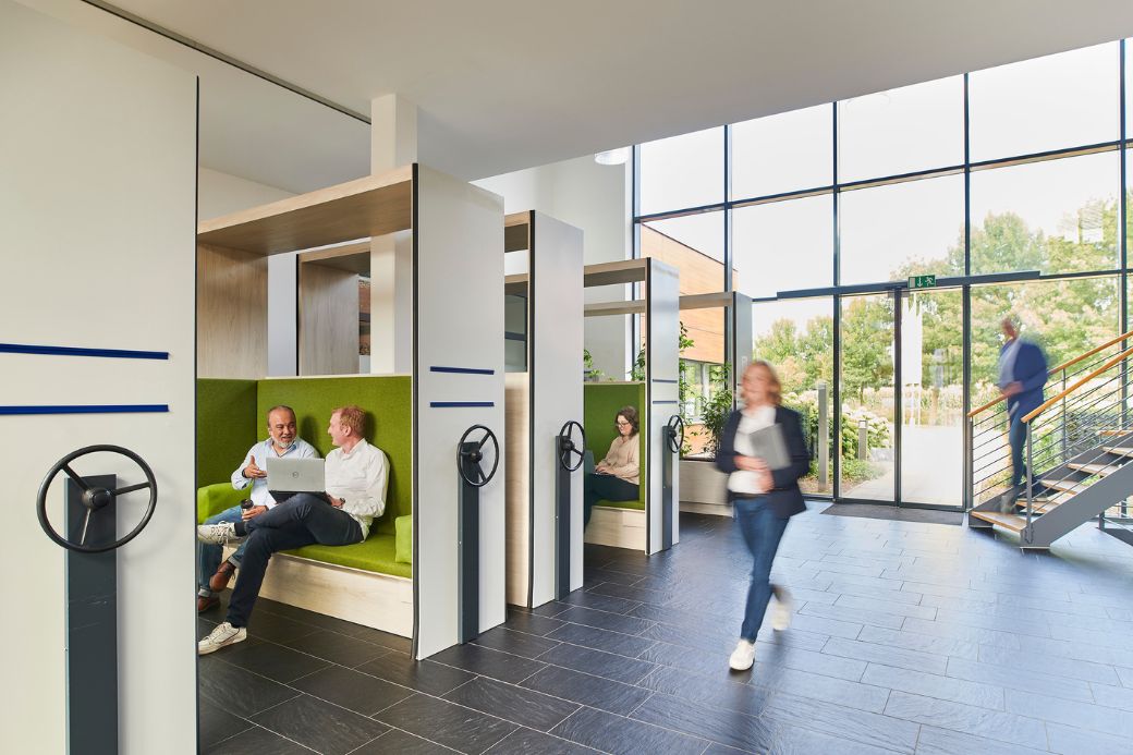 Employee walking at d.velop campus