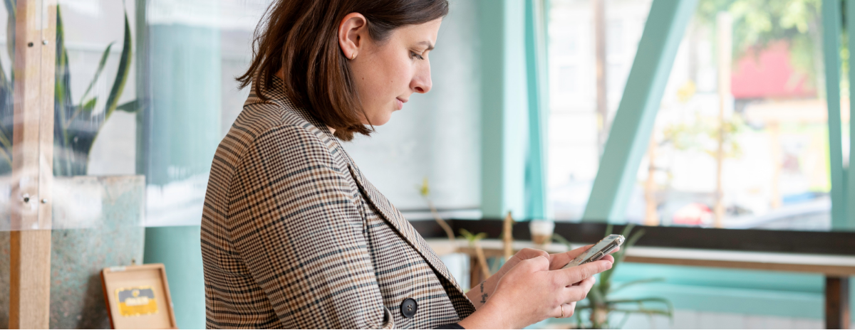 business woman with phone in her hands