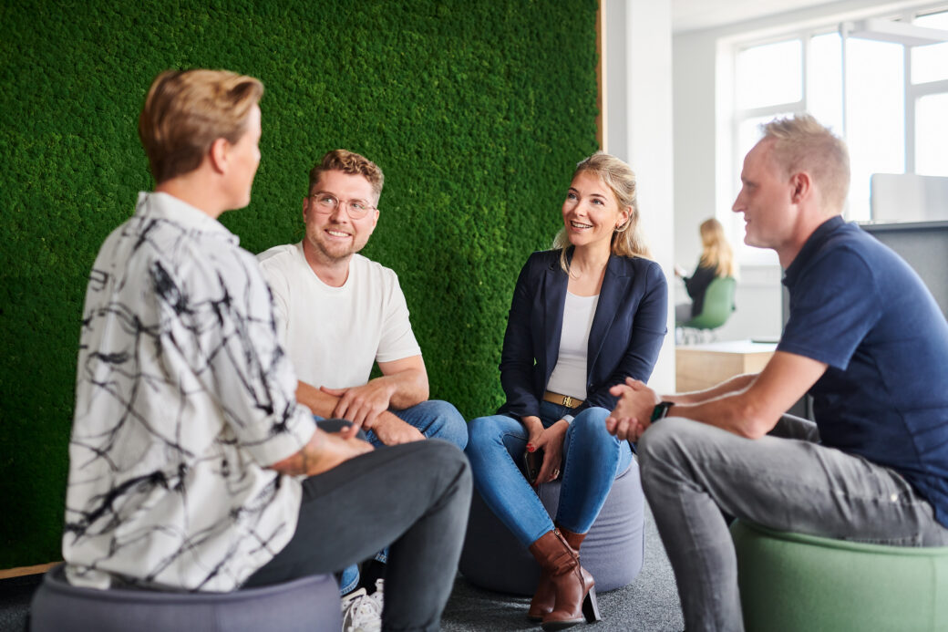 d.velop employees sitting together